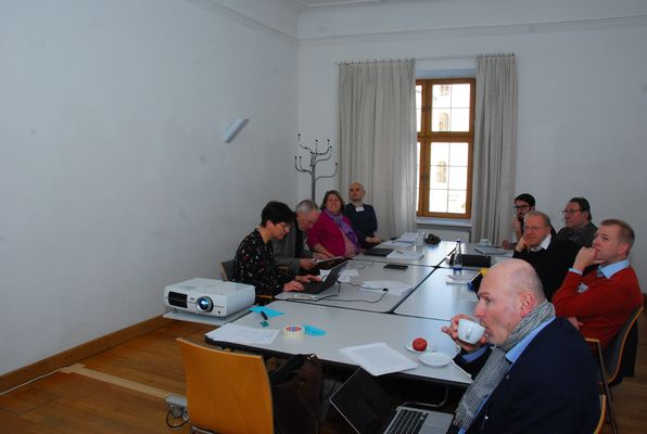 Nine participants during a group work session on soil preservation